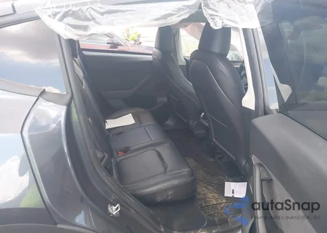 2023 Tesla Model Y Rwd z USA, uszkodzony, nr VIN 7SAYGDED6PF945373